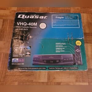 NEW QUASAR 4 HEAD VCR CASSETTE RECORDER IN THE ORIGINAL BOX.